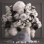 Bouquet white of flowers in a gift box