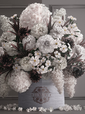 Bouquet white of flowers in a gift box