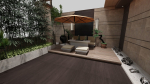Courtyard patio with orange umbrella