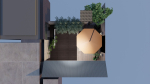 Courtyard patio with orange umbrella