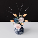 Decor bouquet of flowers in a glass vase