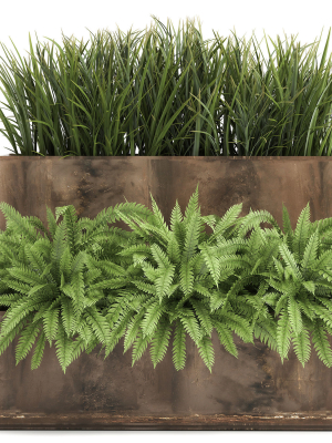 Ornamental grass in a rusty flower pot for the interior 940
