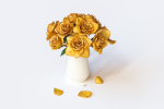 Yellow flowers in ceramic pot